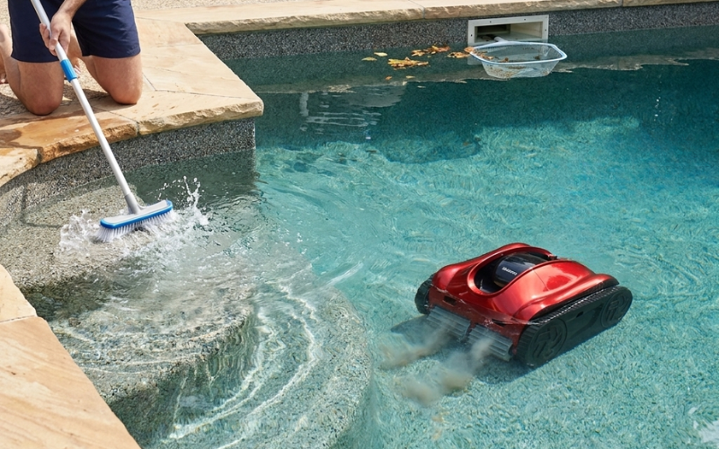 How Robotic Pool Cleaners Work Alongside Skimmers Pumps and Manual Brushing